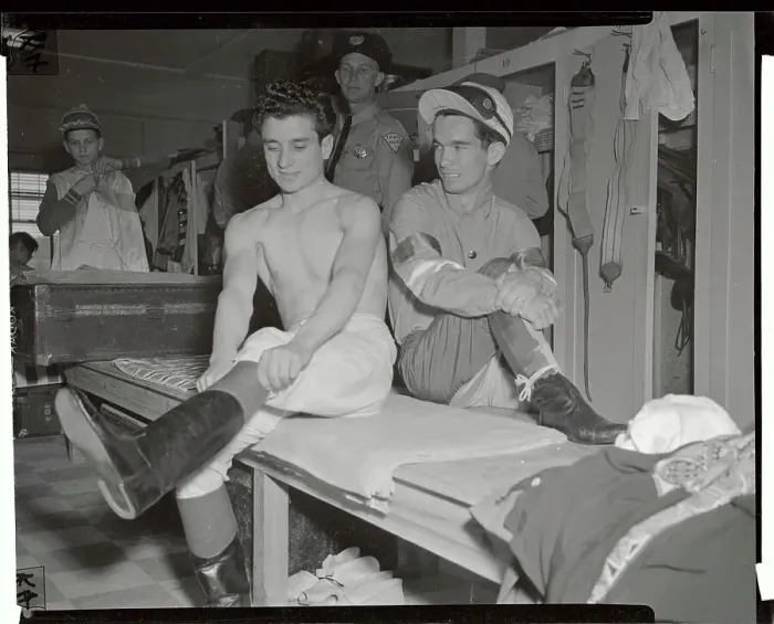 Framed Print : Willie Shoemaker Watching Joe Culmone Pulling on Boots Framed Print : Willie Shoemaker Watching Joe Culmone Pulling on Boots