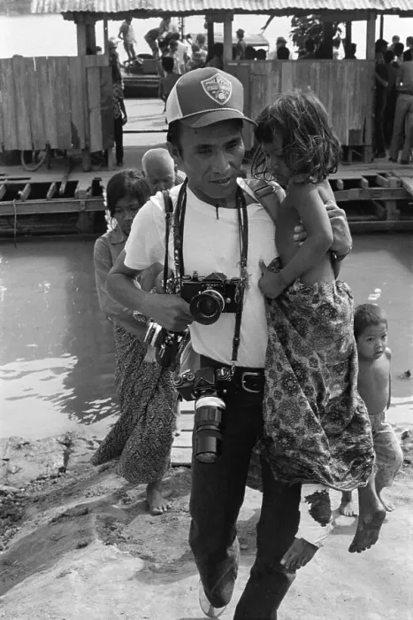 Framed Print : Willy Vicoy Carrying Cambodian Girl Framed Print : Willy Vicoy Carrying Cambodian Girl