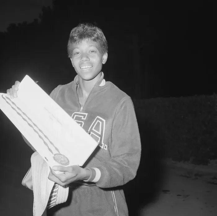 Framed Print : Wilma Rudolph Holding Olympic Gold Medal Framed Print : Wilma Rudolph Holding Olympic Gold Medal