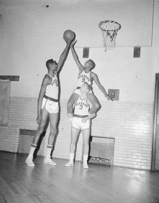 Framed Print : Wilt Chamberlain Competing with Martin Hughes Riding Piggyback Framed Print : Wilt Chamberlain Competing with Martin Hughes Riding Piggyback