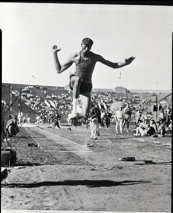 Framed Print : Wilt Chamberlain in Mid Air Doing Long Jump Framed Print : Wilt Chamberlain in Mid Air Doing Long Jump