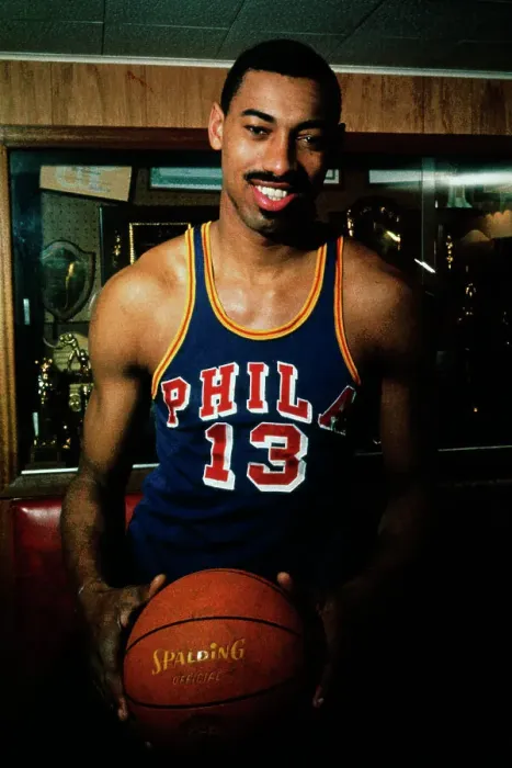 Framed Print : Wilt Chamberlain Standing by Trophy Display Framed Print : Wilt Chamberlain Standing by Trophy Display