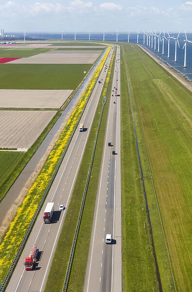 Wind turbines along coastline, North Holland, Netherlands