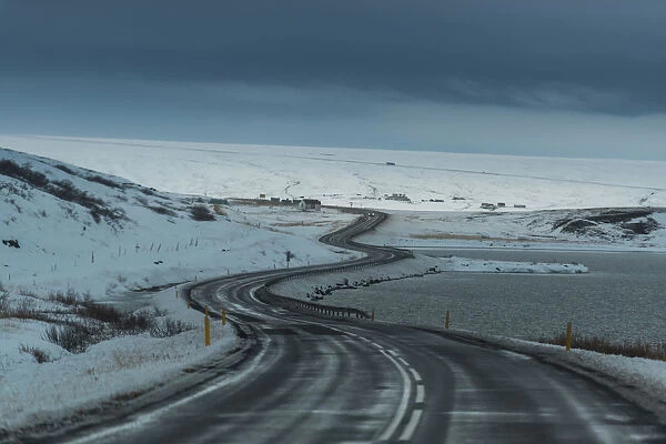 Winding road through Iceland winter landscape