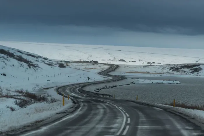 Framed Print : Winding road through Iceland winter landscape