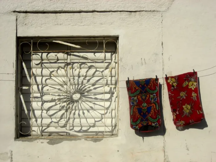 Framed Print : Window with grille and laundry on line. Cienfuegos, Cuba Framed Print : Window with grille and laundry on line. Cienfuegos, Cuba