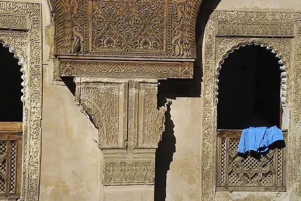 Window and carved decorations Medersa es Sahrij old Medina Fez Morocco