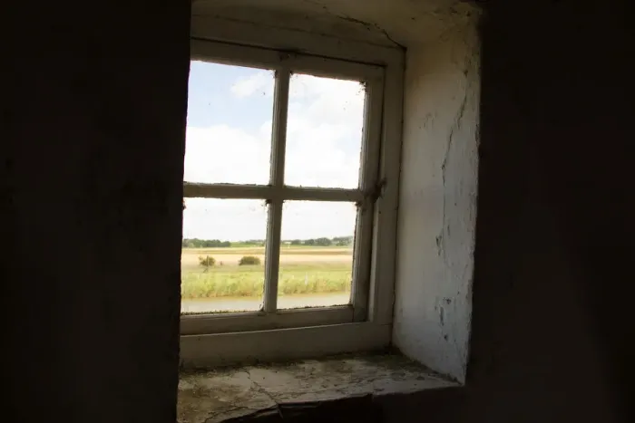 Framed Print : A window looks out from the Tracey Arms Drainage Mill over the River Bure Framed Print : A window looks out from the Tracey Arms Drainage Mill over the River Bure