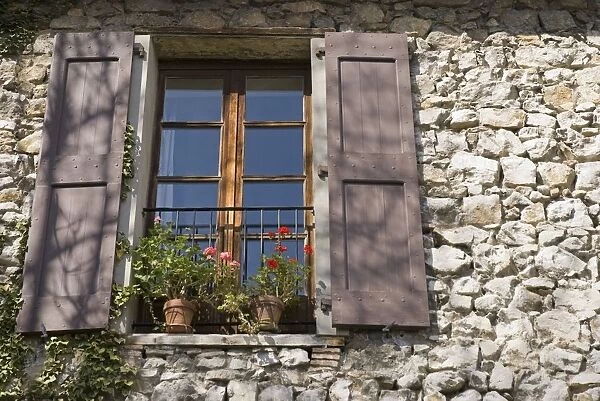 Window Of An Old Stone-Walled European House