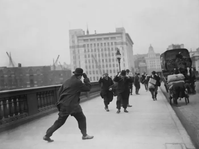 Framed Print : Windy Day. A windy day on London bridge, hats have to be firmly held on Framed Print : Windy Day. A windy day on London bridge, hats have to be firmly held on
