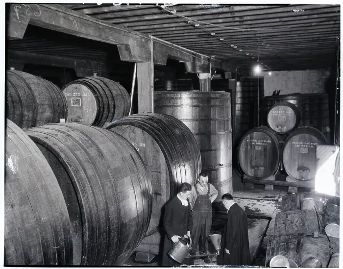 Framed Print : Winery Workers Surrounded by Giant Casks Framed Print : Winery Workers Surrounded by Giant Casks