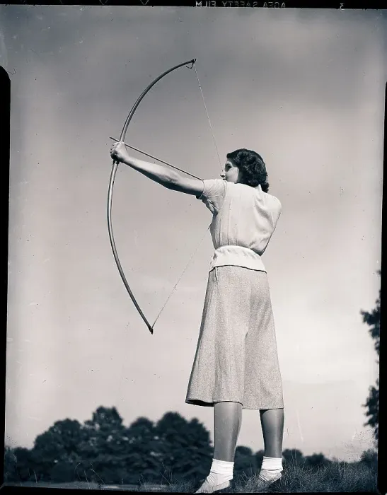 Framed Print : Woman Aiming Bow and Arrow Framed Print : Woman Aiming Bow and Arrow