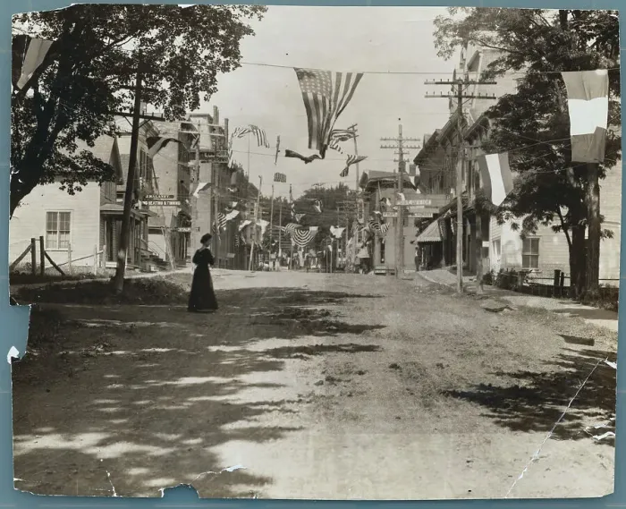 Framed Print : Woman on American Flag Draped Street