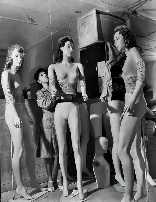 Framed Print : Woman Assembling Mannequins Framed Print : Woman Assembling Mannequins