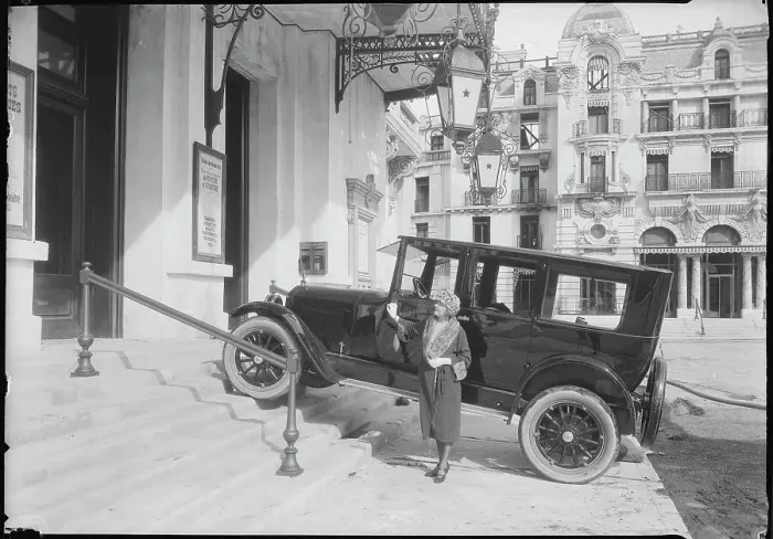 Framed Print : Woman and Automobile on Steps of Hotel