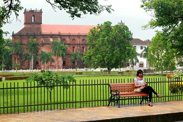 Woman in front of Basilica of Bom Jesus at Old Goa