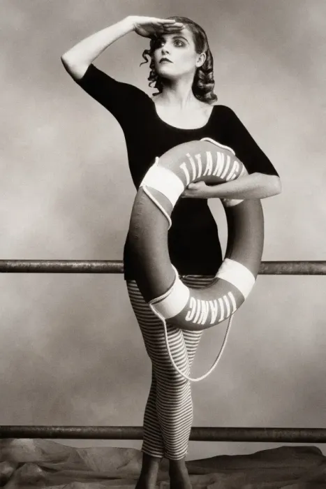 Framed Print : Woman in bathing costume holding life preserver Framed Print : Woman in bathing costume holding life preserver