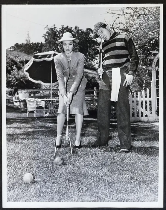 Framed Print : Woman Beating Man in a Game of Croquet Framed Print : Woman Beating Man in a Game of Croquet