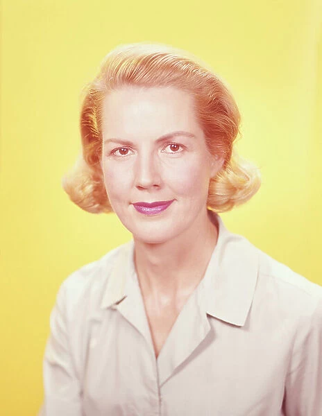 Woman with blonde hair in studio