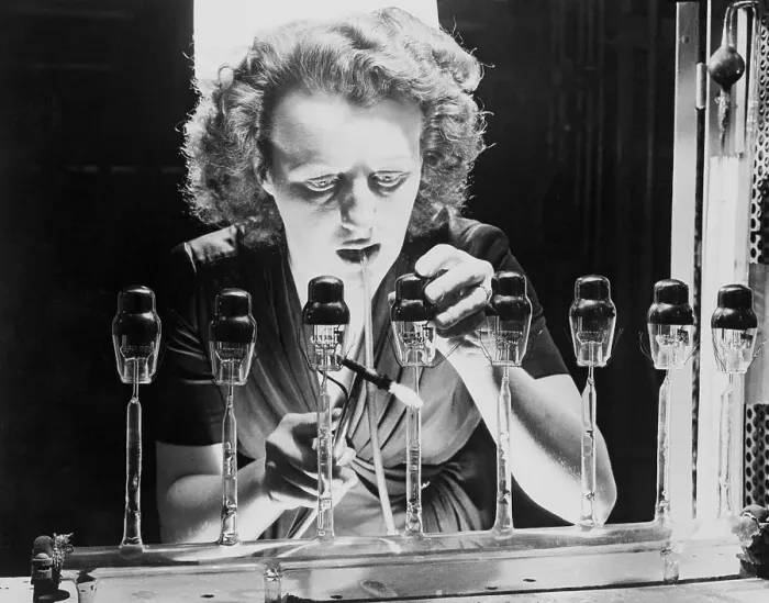 Framed Print : Woman Blowing Glass Vacuum Tubes Framed Print : Woman Blowing Glass Vacuum Tubes