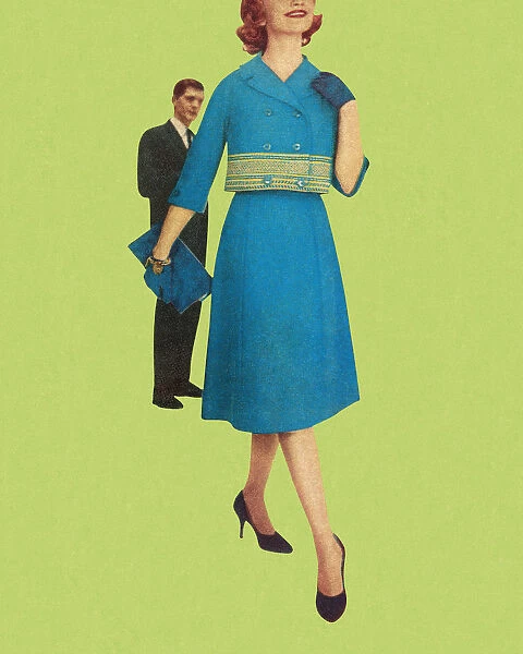 Woman in Blue Suit and Man Behind Her