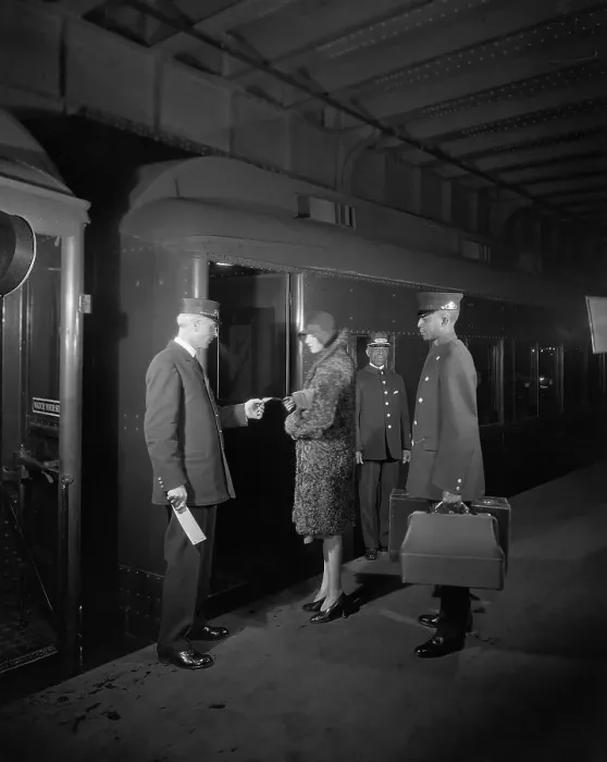 Framed Print : Woman About To Board Train / Conductor