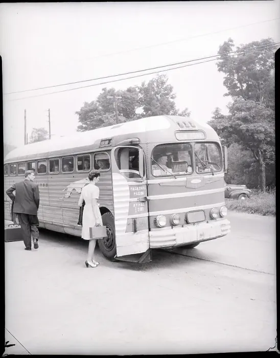 Framed Print : Woman Boarding Greyhound Bus Framed Print : Woman Boarding Greyhound Bus