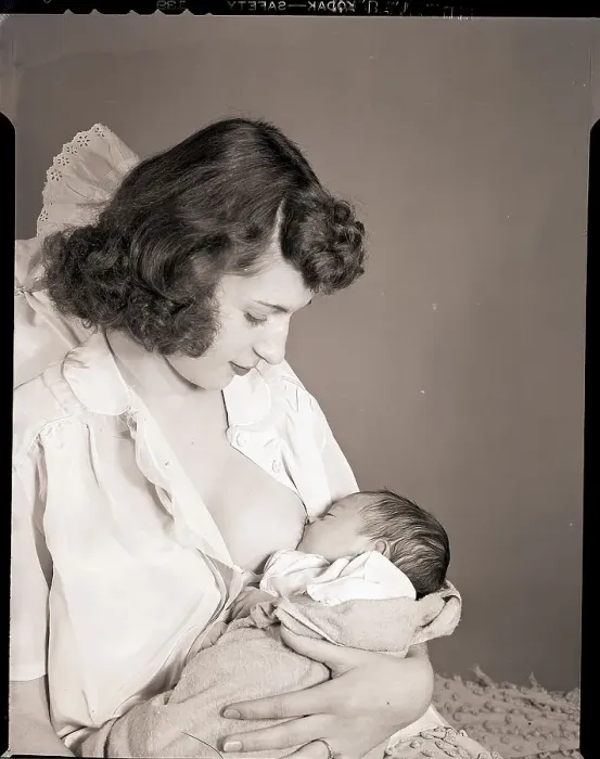 Framed Print : Woman Breast Feeding Her Baby Framed Print : Woman Breast Feeding Her Baby