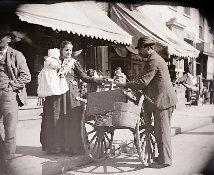Framed Print : Woman Buying From Huckster On Street Framed Print : Woman Buying From Huckster On Street