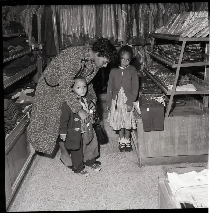Framed Print : Woman with Children Shopping in Store Framed Print : Woman with Children Shopping in Store