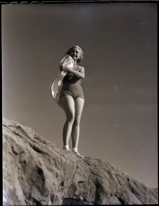 Framed Print : Woman on Coastal Rock with Her Scarf Framed Print : Woman on Coastal Rock with Her Scarf