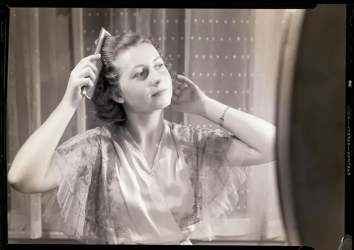 Framed Print : Woman Combing Her Hair