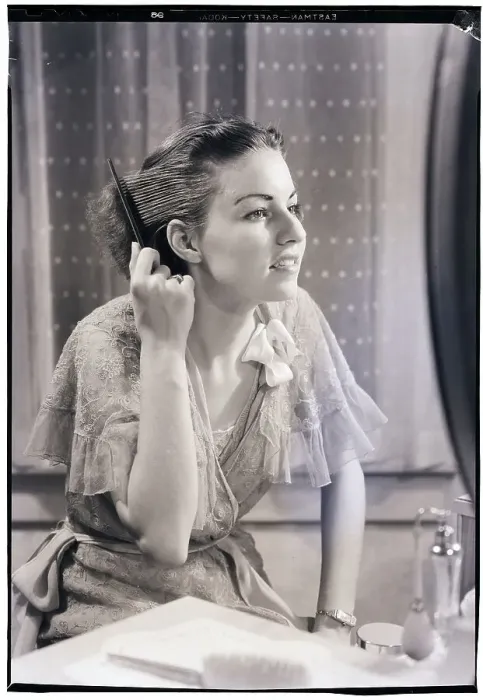 Framed Print : Woman Combing Her Hair Framed Print : Woman Combing Her Hair