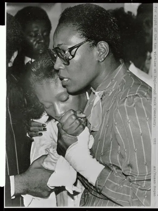 Framed Print : Woman Comforting Another at Funeral Framed Print : Woman Comforting Another at Funeral