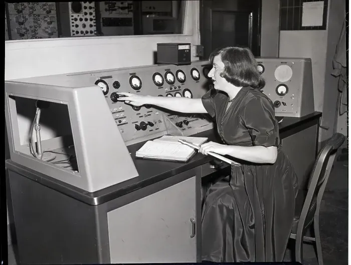 Framed Print : Woman At Controls Of Cyclotron Framed Print : Woman At Controls Of Cyclotron
