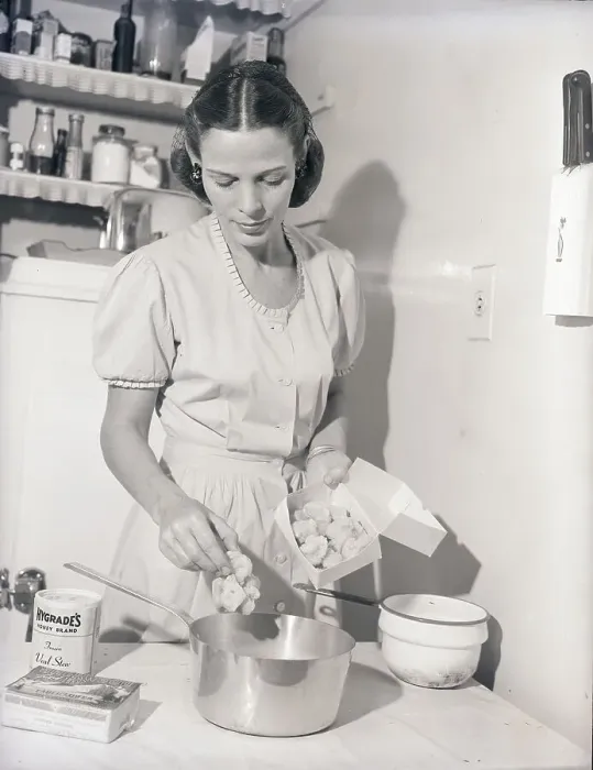 Framed Print : Woman Cooking Frozen Cauliflower Framed Print : Woman Cooking Frozen Cauliflower