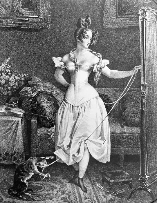 Framed Print : Woman in Corset with Cat Toying at Her Ribbon Framed Print : Woman in Corset with Cat Toying at Her Ribbon
