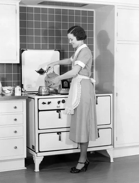 Framed Print : Woman In Cotton Dress & Maid Apron Standing Framed Print : Woman In Cotton Dress & Maid Apron Standing
