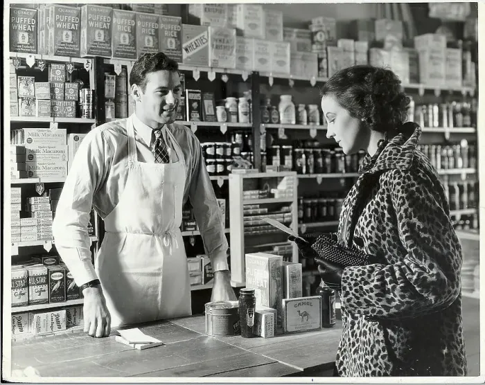 Framed Print : Woman At Counter In Grocery Store Framed Print : Woman At Counter In Grocery Store