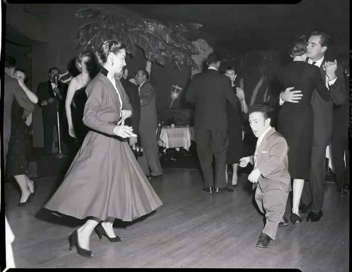 Framed Print : Woman Dancing with Little Person Framed Print : Woman Dancing with Little Person