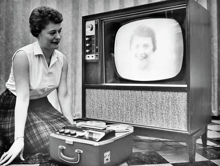 Framed Print : Woman Demonstrates New Video Recording Process Framed Print : Woman Demonstrates New Video Recording Process
