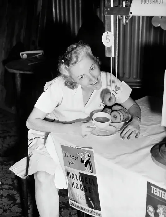 Framed Print : Woman Demonstrating Donut Dunker; Coffee Framed Print : Woman Demonstrating Donut Dunker; Coffee