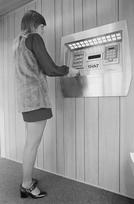 Framed Print : Woman Demonstrating First Automated Teller Machine at Bank Framed Print : Woman Demonstrating First Automated Teller Machine at Bank