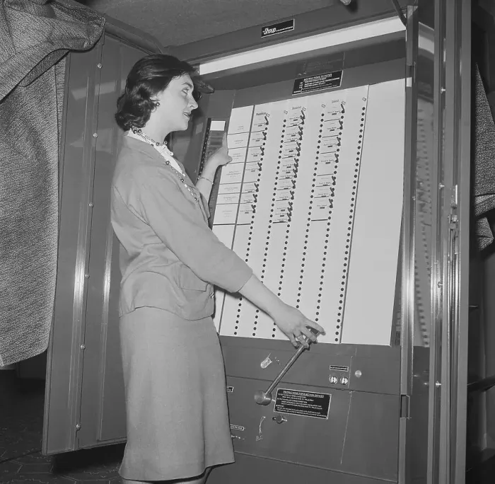 Framed Print : Woman Demonstrating Voting Machine Framed Print : Woman Demonstrating Voting Machine