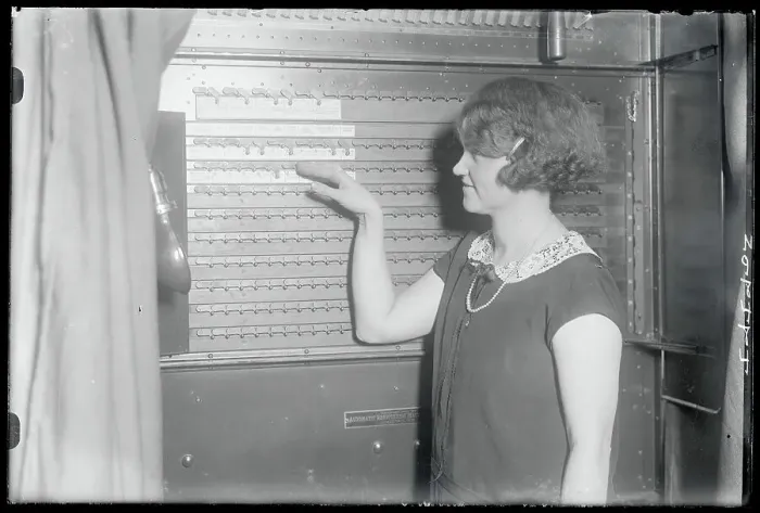 Framed Print : Woman Demonstrating a Voting Machine Framed Print : Woman Demonstrating a Voting Machine