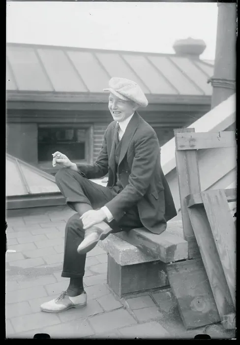 Framed Print : Woman Disguised as Man on Roof Framed Print : Woman Disguised as Man on Roof