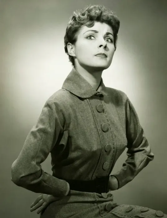 Framed Print : Woman with displeased expression posing in studio, (B&W), portrait Framed Print : Woman with displeased expression posing in studio, (B&W), portrait