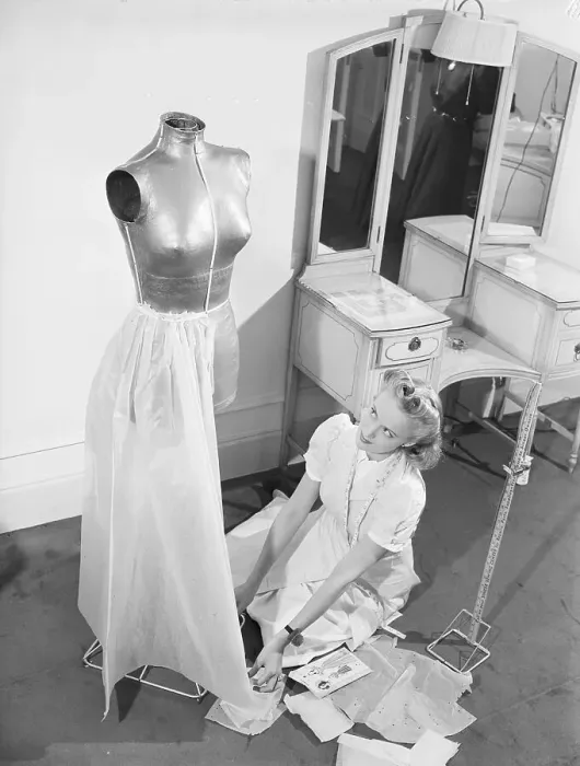 Framed Print : Woman Doing Dress Alterations On Mannequ Framed Print : Woman Doing Dress Alterations On Mannequ