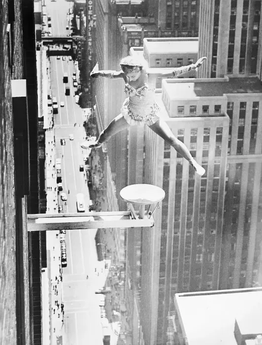 Framed Print : Woman Doing Stunts On Building