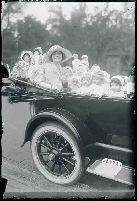 Framed Print : Woman With Doll Collection